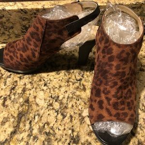 Open toe with back strap great with jeans.